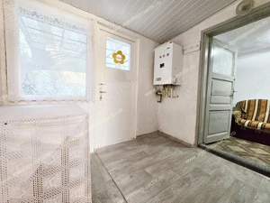 Imobil amplasat pe Bd. George Coșbuc, ideal pentru locuință sau activități comerciale. - imagine 15