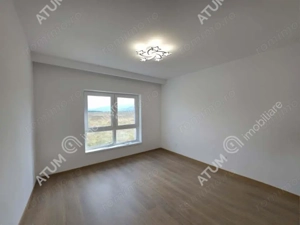 Apartament cu 3 camere  balcon loc de parcare zona Doamna Stanca