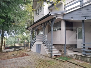 Cabană de vânzare cu teren generos în Beliș