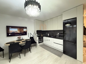 Locuință elegantă cu terasă generoasă și parcare subterană