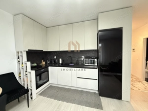 Locuință elegantă cu terasă generoasă și parcare subterană - imagine 3