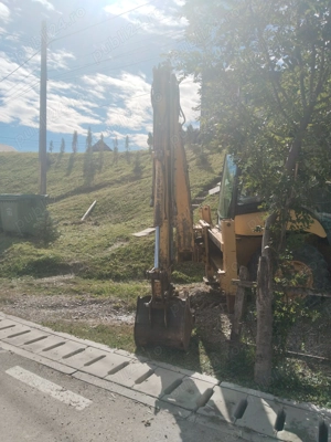 Buldoexcavator Komatsu 97s  - imagine 7