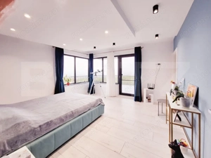 O locuință de excepție, unde confortul întâlnește panorama orașului - imagine 19 O locuință de excepție, unde confortul întâlnește panorama orașului - imagine 19