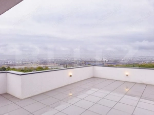 O locuință de excepție, unde confortul întâlnește panorama orașului - imagine 17 O locuință de excepție, unde confortul întâlnește panorama orașului - imagine 17