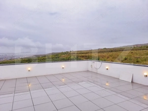 O locuință de excepție, unde confortul întâlnește panorama orașului - imagine 18 O locuință de excepție, unde confortul întâlnește panorama orașului - imagine 18