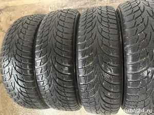 Set roți iarnă jante oțel cu anvelope Nokian 165/65/R14 79T + capace originale Toyota Aygo - imagine 2