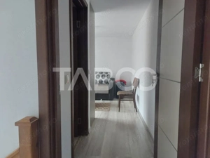 Casa in zona centrala 5 camere 2 bucatarii 3 bai curte comuna Cisnadie - imagine 19