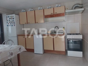 Apartament la casa 97 mpu 5 camere 2 bucatarii 3 bai gradina Cisnadie - imagine 6