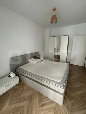  Apartament cu 2 camere, semidecomandat, finisat și mobilat, în zona centrală