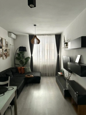 Apartament 3 camere   mobilat si utilat  loc de parcare inclus