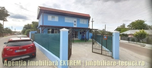 Spaţiu multifuncţional 202mp şi casă de locuit la Drăgăneşti