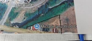 Vand teren intravilan cu vad comercial la DN