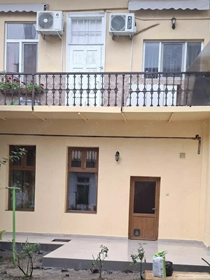 Casă cu curte comuna - zona centrala