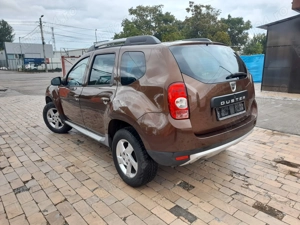 Duster Laureat 1.6 - 6Trepte - Tractiune 4x4 - imagine 3