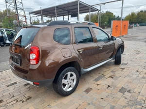 Duster Laureat 1.6 - 6Trepte - Tractiune 4x4 - imagine 4