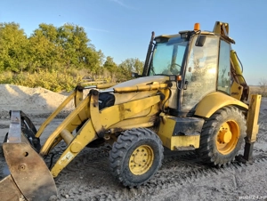 Vand Buldoexcavator Komatsu