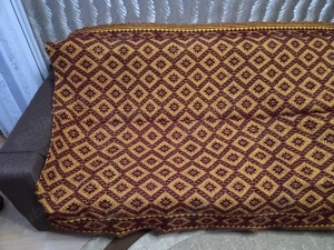 Cuvertura tesuta la razboi