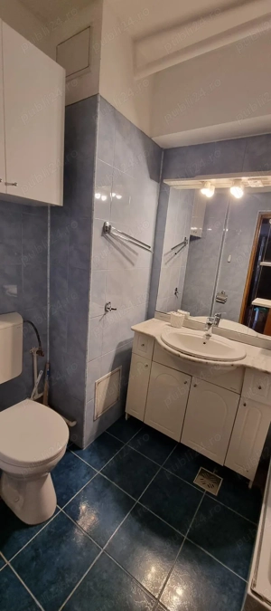 Ofer spre închiriere apartament cu 3 camere - imagine 5