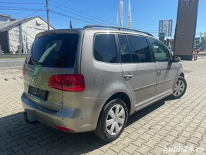 Vw Touran 1.6Tdi-Climatronic-Tempomat-Parcheaza singura ! - imagine 4 Vw Touran 1.6Tdi-Climatronic-Tempomat-Parcheaza singura ! - imagine 4