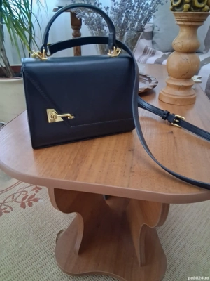 Vând poșetă neagra