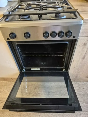 Vând aragaz artic , cu aprindere electrică 