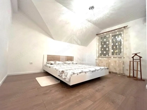 Casa individuala cu 6 camere, 3 bai, garaj, teren 500 mp si 2 fronturi - imagine 6