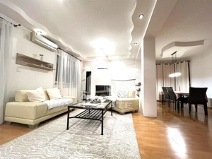 Casa individuala cu 6 camere, 3 bai, garaj, teren 500 mp si 2 fronturi - imagine 2