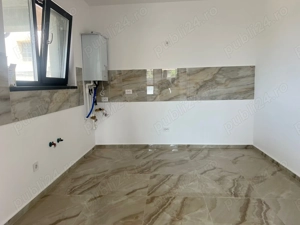 Casa parter - 500 m de RTB- 4 camere - 2 bai - pod - beci - incalzire pardoseala - imagine 4 Casa parter - 500 m de RTB- 4 camere - 2 bai - pod - beci - incalzire pardoseala - imagine 4