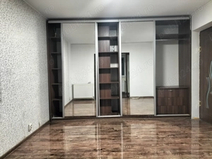                         Vând apartament 55 mp - parter, cu balcon
