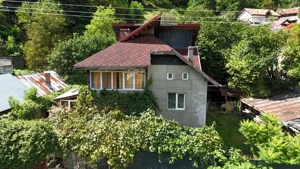 Casă de vânzare zona centrala langa magazinul Penny Brezoi - imagine 6 Casă de vânzare zona centrala langa magazinul Penny Brezoi - imagine 6