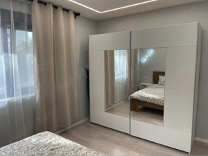 Apartament doua camere cu gradina de inchiriat odaile otopeni curte - imagine 4