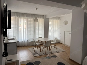 Prima Inchirere Garsoniera - imagine 2