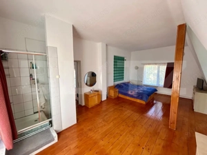 Casa moderna cu design deosebit,situata intr-o zona linistita. - imagine 8