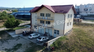 Proprietate cu hală producție   depozitare și sediu administrativ de vânzare în Curtea de Argeș. - imagine 3