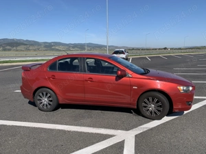 Mitsubishi Lancer rosu, stare impecabila, 140 CP, 147.000 km reali