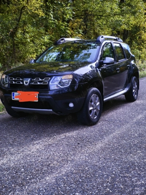 Dacia Duster .1.5 dCi .4X4 .2015 .110 CP .110.000 KM .Negru metalizat - imagine 3 Dacia Duster .1.5 dCi .4X4 .2015 .110 CP .110.000 KM .Negru metalizat - imagine 3