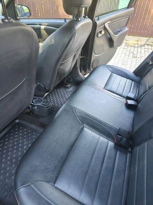 Dacia Duster .1.5 dCi .4X4 .2015 .110 CP .110.000 KM .Negru metalizat - imagine 4 Dacia Duster .1.5 dCi .4X4 .2015 .110 CP .110.000 KM .Negru metalizat - imagine 4