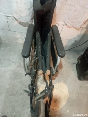 Vand scaun cu rotile 