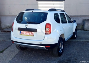 Dacia Duster 1.5 dCi 110CP 4x2 2013 08 - imagine 2 Dacia Duster 1.5 dCi 110CP 4x2 2013 08 - imagine 2