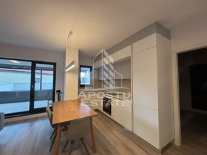 Apartament cu 3 camere,2 bai la Isho, balcon mare 20 mp, etajul intai - imagine 2