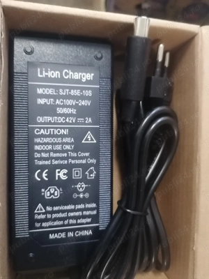 Incarcator trotineta bicicleta electrica 59 ron NOU  42v 2A model XIAOMI