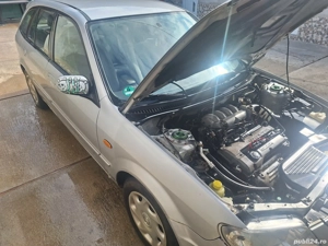 Dezmembrez Mazda 323F