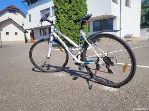 Vând bicicletă Trekking.