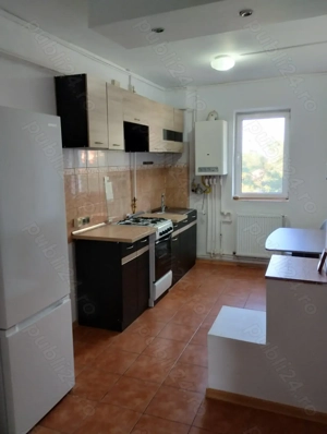 Închiriez apartament cu 2 camere
