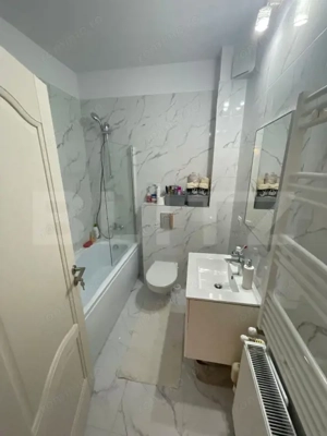 Garsoniera spatioasa zarnesti , stare impecabila . - imagine 4