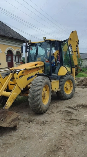 Buldoexcavator Komatsu 