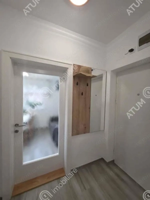 Garsoniera decomandata cu balcon si parcare in zona DaVinci din Sibiu - imagine 14