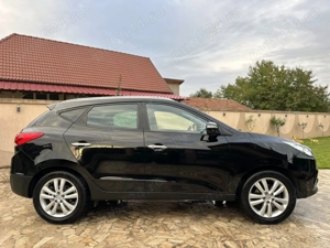 Hyundai Tucson IX35-AWD-2,00 CRDI-Automat-184 CP  - imagine 8 Hyundai Tucson IX35-AWD-2,00 CRDI-Automat-184 CP  - imagine 8