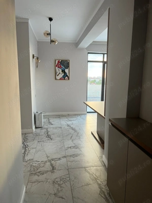 Închiriez apartament cu 2 camere - imagine 5 Închiriez apartament cu 2 camere - imagine 5