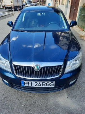 Skoda octavia 2facelift 1,6 tdi 105cai an 2013